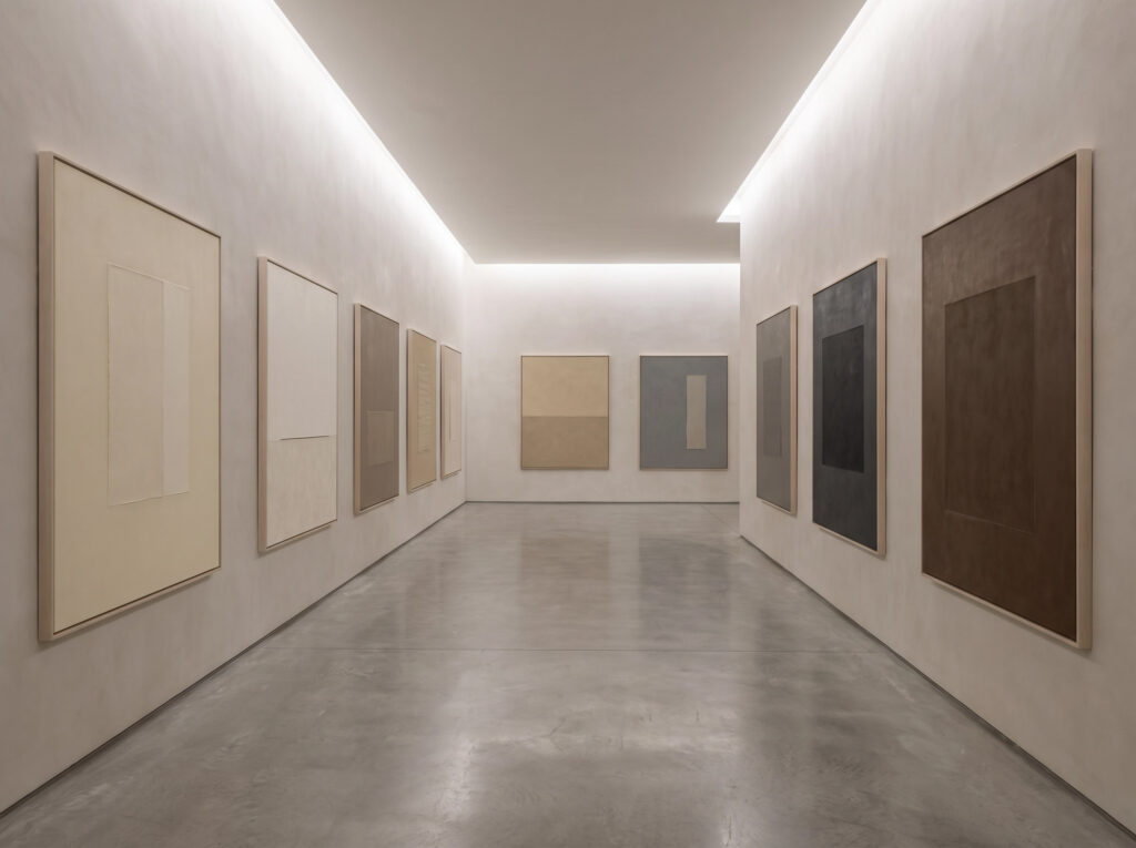 The gallery journey in Minimalist Color Psychology: A hallway acting as a rhythmic gallery.
