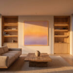 Apple-style minimalist living room at sunset featuring a serene abstract painting as an emotional sanctuary.