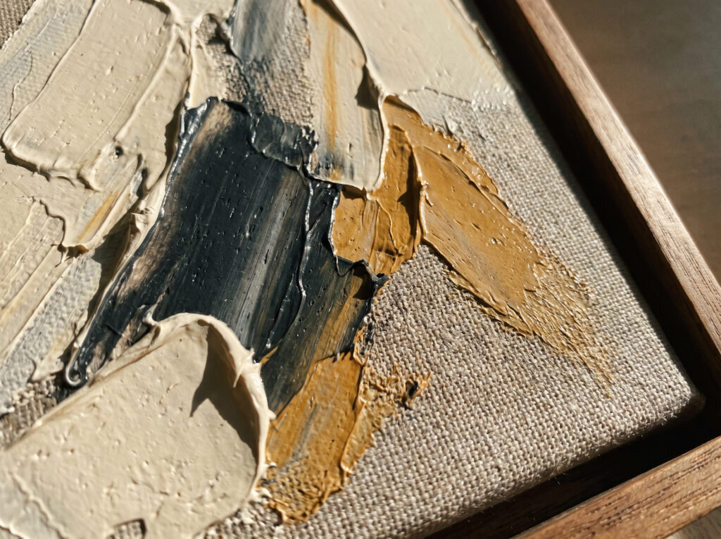Extreme close-up of a high-end minimalist painting, focusing on the rich texture and material integrity.